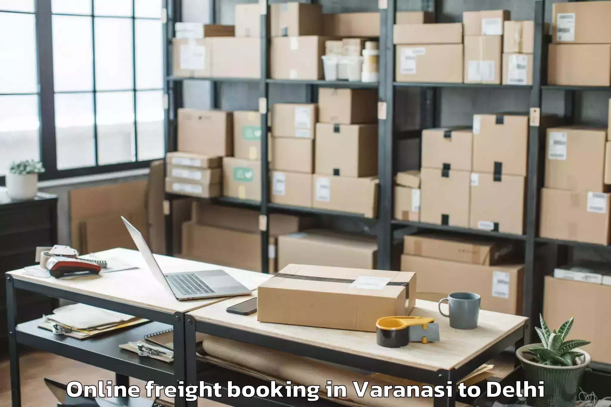 Book Varanasi to Dlf Promenade Mall Online Freight Booking Online